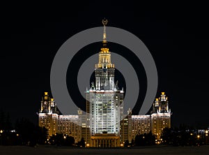 The main building of Moscow State University at night illuminati