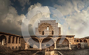 The main church of the Virgin Mary of Diyarbakir, Turkey. Front view of historic churches and clouds in sky