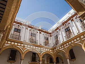 The main courtyard of the old historical women\'s hospital Nuestra Senora del Carmen hospital in CÃÂ¡diz, Andalusia, Spain photo