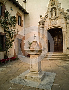 Main entrance cross Saint Martin Viladrau church