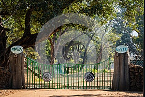 Main entrance gate of tala zone locked and closed for safari and tourist at bandhavgarh national park or tiger reserve photo