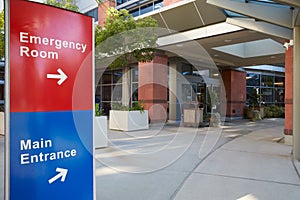 Main Entrance Of Modern Hospital Building With Signs photo