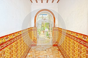 Main entrance porch to the ancient Seville houses.