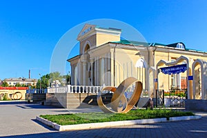 Main Entrance to the large Cinema Theater, called Wostok with Monuments. Located in Temirtau, Kazakhstan