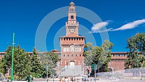 Main entrance to the Sforza Castle - Castello Sforzesco and fountain in front of it timelapse, Milan, Italy