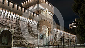 Main entrance to the Sforza Castle and tower - Castello Sforzesco night timelapse, Milan, Italy