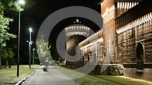 Main entrance to the Sforza Castle and tower - Castello Sforzesco night timelapse, Milan, Italy