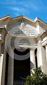 Main facade of the Basilica of the Sacred Heart Immaculate of Mary, in Piazza Euclide in Rome. with a Greek cross plan inscribed i