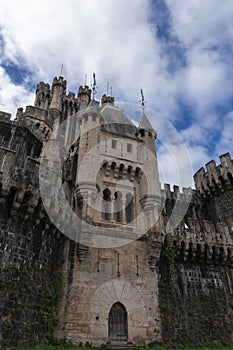 Facade of butron castle on a cloudy day