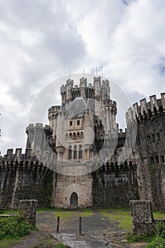 Main facade of butron castle on a cloudy day