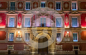 Main facade of the Episcopal Palace of Murcia with colorful and profuse decoration photo