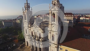 Main facade of the Estrela Basilica in Lisbon at morning aerial view