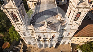 Main facade of the Estrela Basilica in Lisbon at morning aerial view