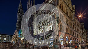 Main facade of the New Town Hall building at the northern part of Marienplatz day to night timelapse in Munich, Germany.