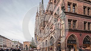 Main facade of the New Town Hall building at the northern part of Marienplatz day to night transition in Munich, Germany