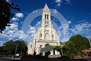 Main facade of the Notre-Dame-du-Rosaire Church, in Saint-Ouen, France . photo