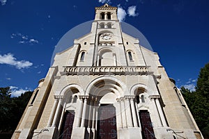 Main facade of the Notre-Dame-du-Rosaire Church, in Saint-Ouen, France . photo