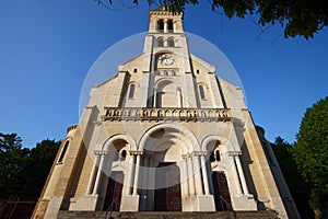 Main facade of the Notre-Dame-du-Rosaire Church, in Saint-Ouen, France . photo