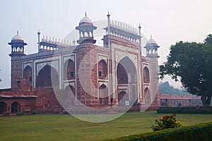 Main Gate to Taj Mahal in the fog in the early morning