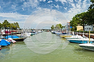 Main harbour with colorful boats in Burano island