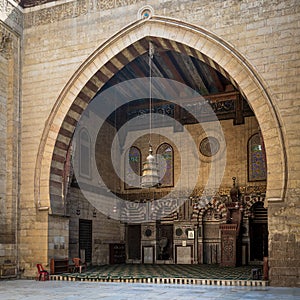 Main iwan - arch - at the courtyard of historic Mamluk era mosque of Al Ashraf Barsbay, Cairo, Egypt photo