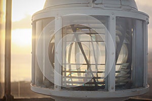 Main light of Lighthouse of Maria Pia looking through the glass lens, in the city of Praia, island of Santiago, Cape Verde