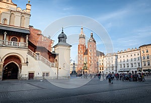 Main Market Square with Cloth Hall and St. Mary`s Basilica - Krakow, Poland