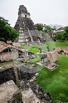 The main plaza of the Maya ruins with `Temple of the great jaguar` in the morning, Peten, Guatemala