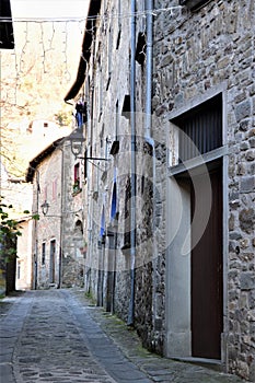 Main and only road that cars can travel in the ancient part of San Romano in Garfagnana.