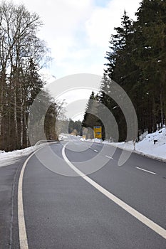 main road in the Eifel, Barweiler towards NÃ¼rburg in winter