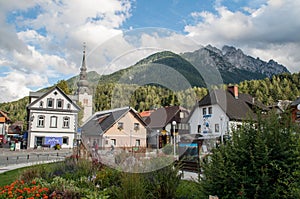 The main square church and mountains in Kranjska gora, Slovenia.