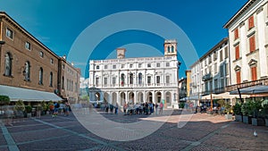 Main square piazza Vecchia in an Italian town Bergamo timelapse. Library and historic buildings. photo