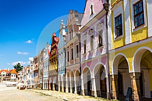 Main square of Telc city, a UNESCO World Heritage Site, on a sunny day with blue sky and clouds, South Moravia, Czech Republic