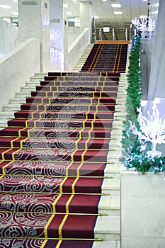 The main staircase with a carpet in New Year photo