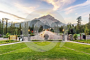 Main street in Banff with Cascade Mountain towering over town, A