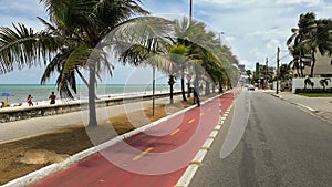 Main street with bike path in front of the beach in Joao Pessoa, Paraiba, Brazil