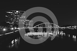 The Main Street Bridge and Scioto River at night, in Columbus, Ohio