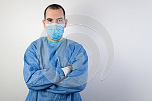 The main subject is out of focus, young male surgeon stand smile health care
