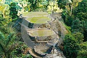 Main terraces of lost city with mountains in its background photo