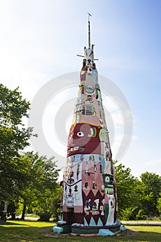 The main totem pole in Ed Galloways Totem Pole Park near Route 66 featuring Native American and Folk Art Foyil Oklahoma USA 5 12 2