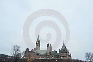 Main tower of the center block of the Parliament of Canada, on Parliament Hill, in Canadian Parliamentary complex of Ottawa. photo
