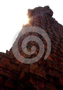 The main tower with sun rays in the ancient Brihadisvara Temple in Thanjavur, india.
