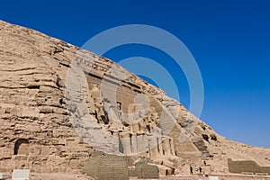 The main view of an Entrance to the Great Temple at Abu Simbel with Ancient Colossal statues of Ramesses II