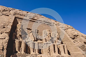 The main view of an Entrance to the Great Temple at Abu Simbel with Ancient Colossal statues of Ramesses II