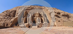 The main view of an Entrance to the Great Temple at Abu Simbel with Ancient Colossal statues of Ramesses II