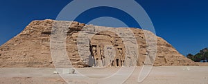 The main view of an Entrance to the Great Temple at Abu Simbel with Ancient Colossal statues of Ramesses II