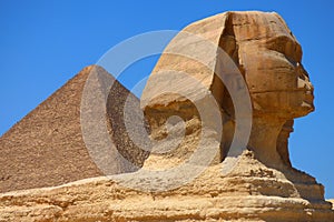 Main view of the Great Sphinx of Giza with Pyramid backwards, Egypt