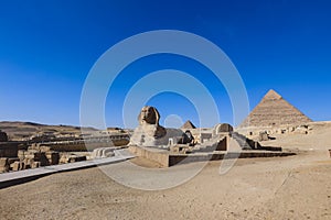 Main View to the Great Sphinx of Giza with the Great Pyramid in Background in Giza, Egypt