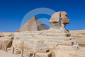 Main View to the Great Sphinx of Giza with the Great Pyramid in Background in Giza, Egypt