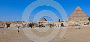 Main View to the Great Sphinx of Giza with the Great Pyramid in Background in Giza, Egypt